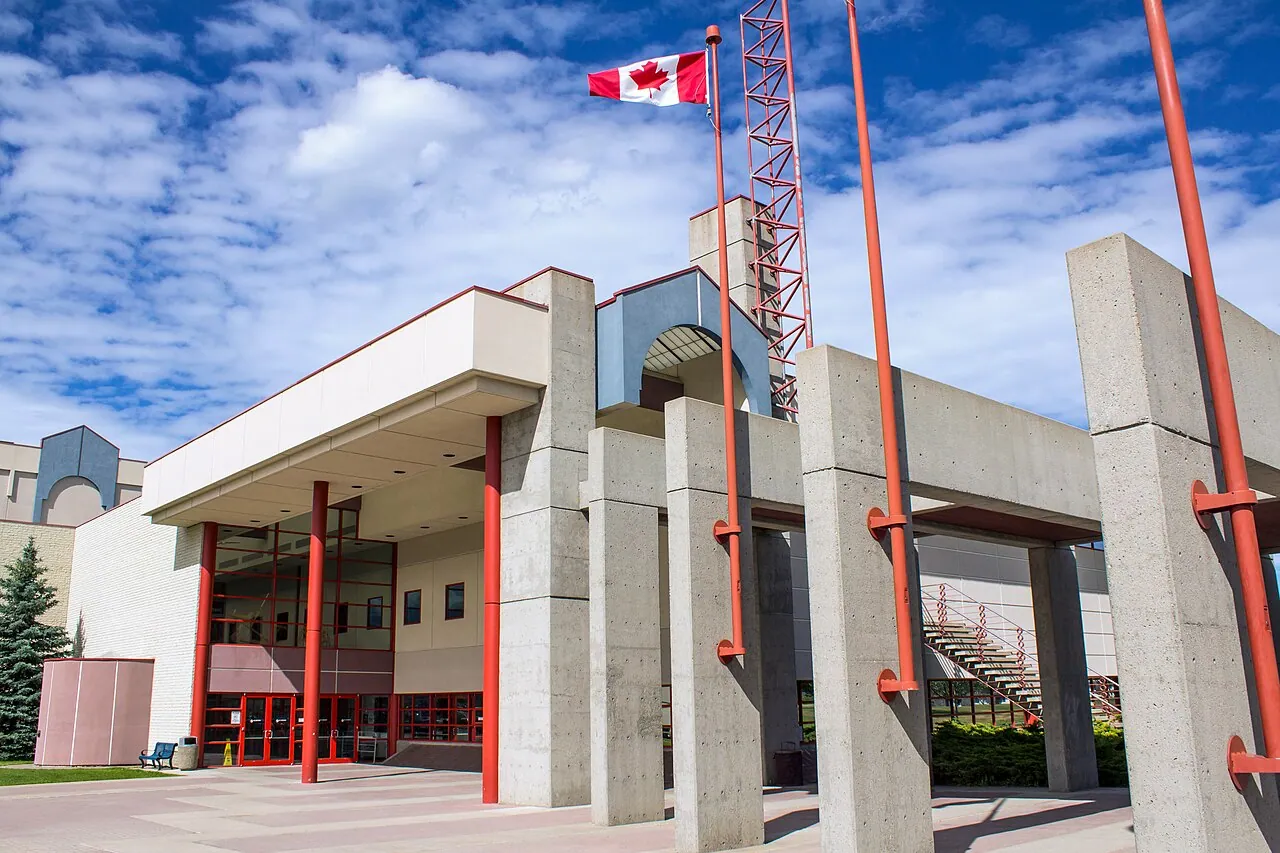 The main entrance of the College of New Caledonia in Prince George under a blue sky