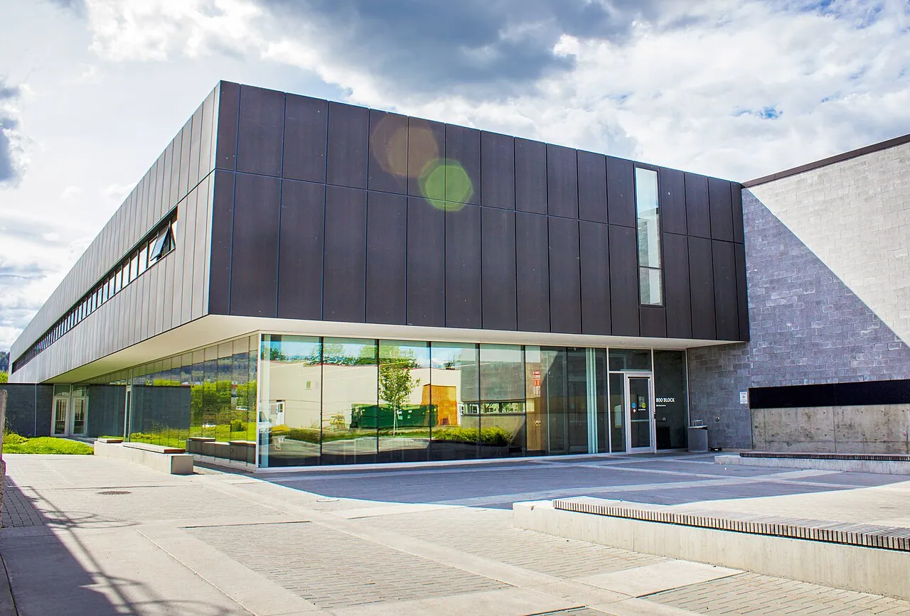 The modern glass and dark-panel Technical Education Centre at the College of New Caledonia