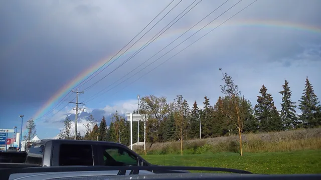 A rainbow over the Prince George skyline